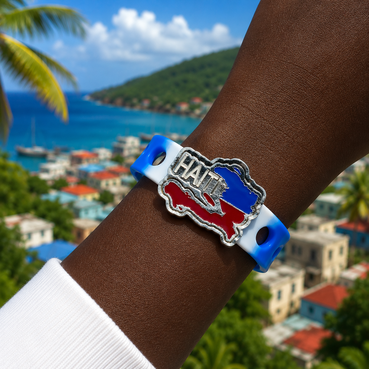 Show your Haitian pride with the Fyète Ayisyen Bracelet. Features a Haiti-shaped charm, adjustable snap-lock fit, and durable silicone band for everyday wear.