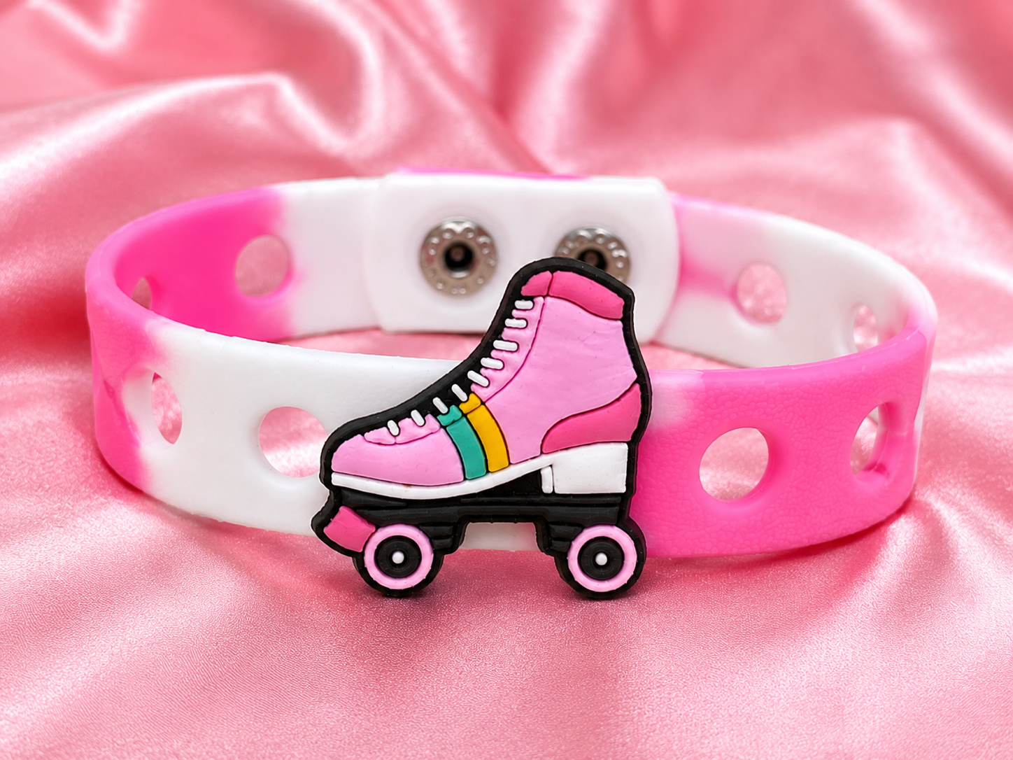 Fun roller skate charm bracelet with an adjustable band. Perfect for kids who love skating, colorful accessories, and playful everyday style.