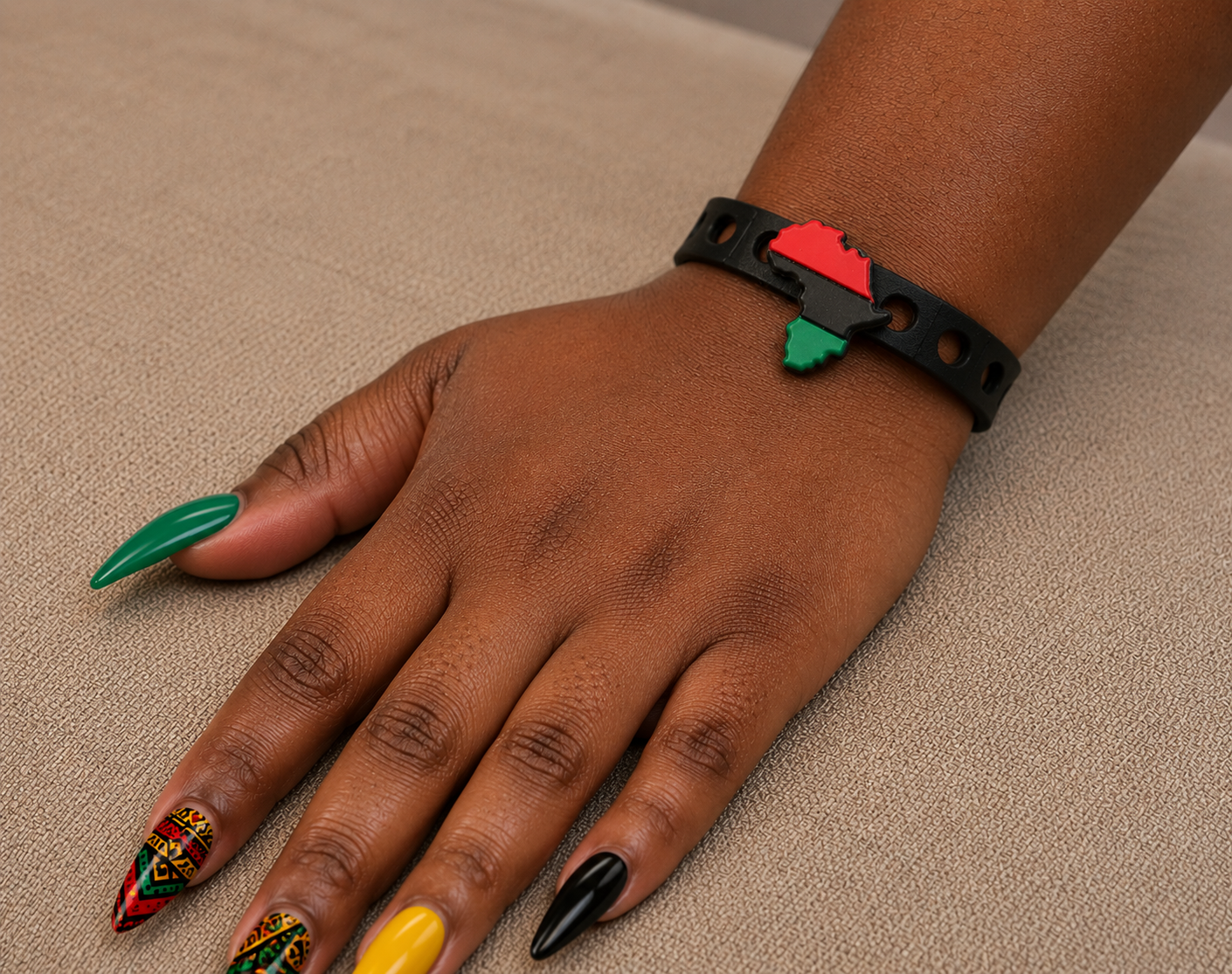 Show your heritage with the Mama Africa Bracelet. Features a bold Africa-shaped charm, Pan-African colors, adjustable fit, and everyday comfort.