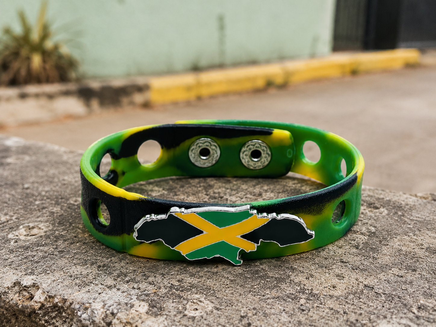 Celebrate Jamaican heritage with the One Love Legacy Bracelet. Featuring a Jamaica-shaped flag emblem and iconic island colors, this bracelet represents unity, culture, and pride.