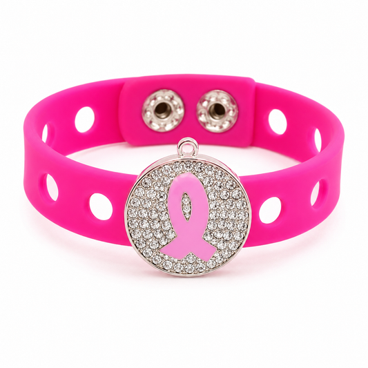🎀 Stylish breast cancer awareness bracelet featuring a sparkling rhinestone ribbon charm and vibrant pink adjustable silicone band.