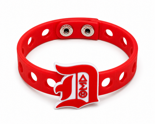 Celebrate leadership, excellence, and sisterhood with the Torch of Excellence Bracelet. A bold red and white snap-lock bracelet designed to inspire and empower.
