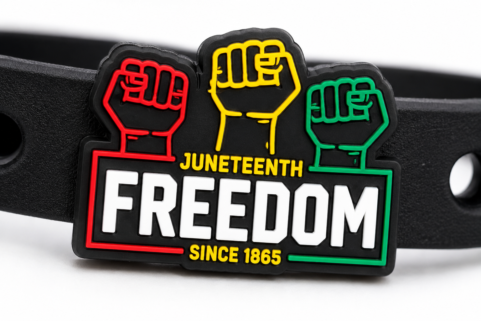 🖤 Bold Juneteenth-inspired bracelet featuring raised fist symbols and “Freedom Since 1865” on a sleek black silicone band celebrating heritage, unity, and Black excellence.