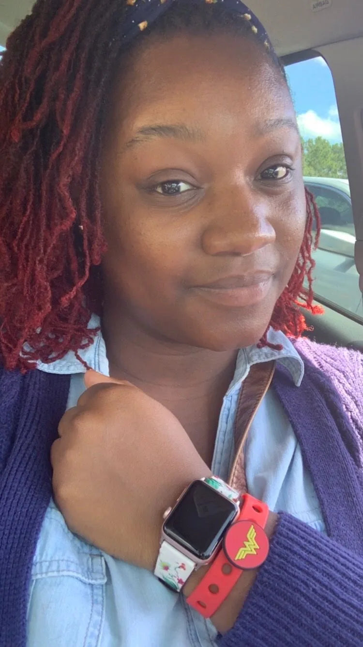 Customer wearing charm bracelet on wrist